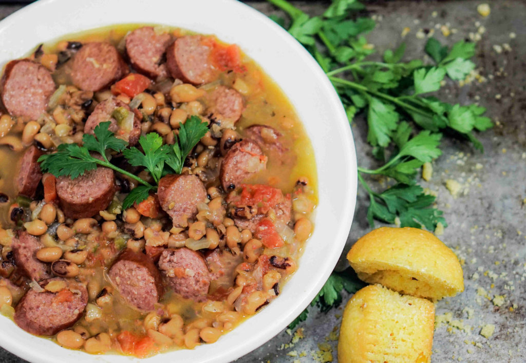 https://auntbeesrecipes.com/wp-content/uploads/2014/10/Smoke-Sausage-and-Black-Eyed-Pea-soup-small-1-1024x707.jpg