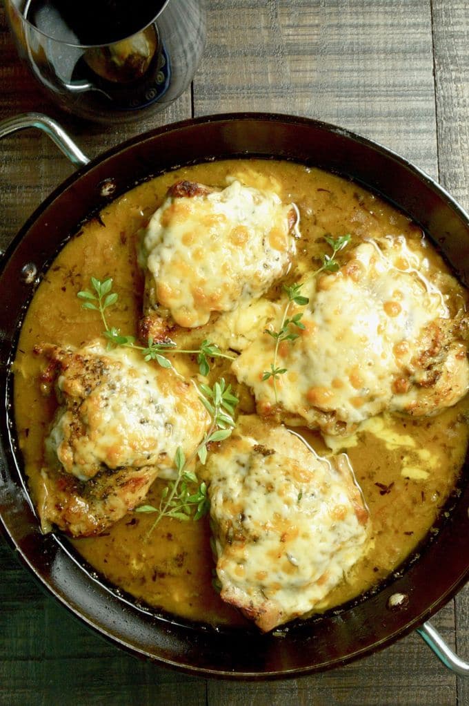 French Onion Chicken: caramelized onions under melted gooey cheese all atop braised tender chicken with a French onion style sauce.
